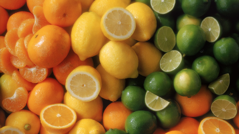 Citrus fruits in color order in pile