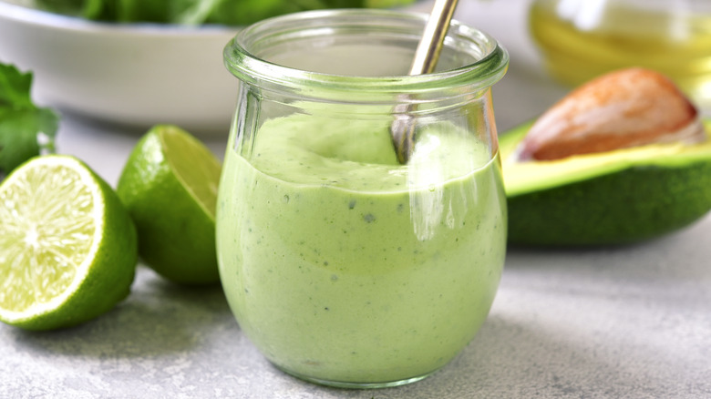 A jar of avocado dressing