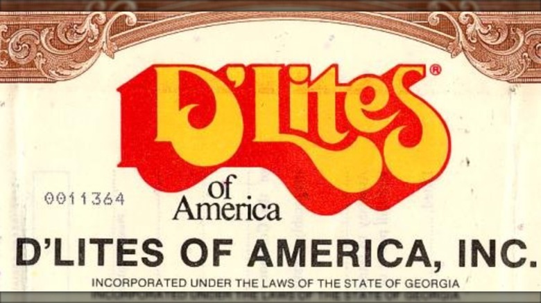 A stock certificate for D'Lites, with the D'Lites logo displayed prominently