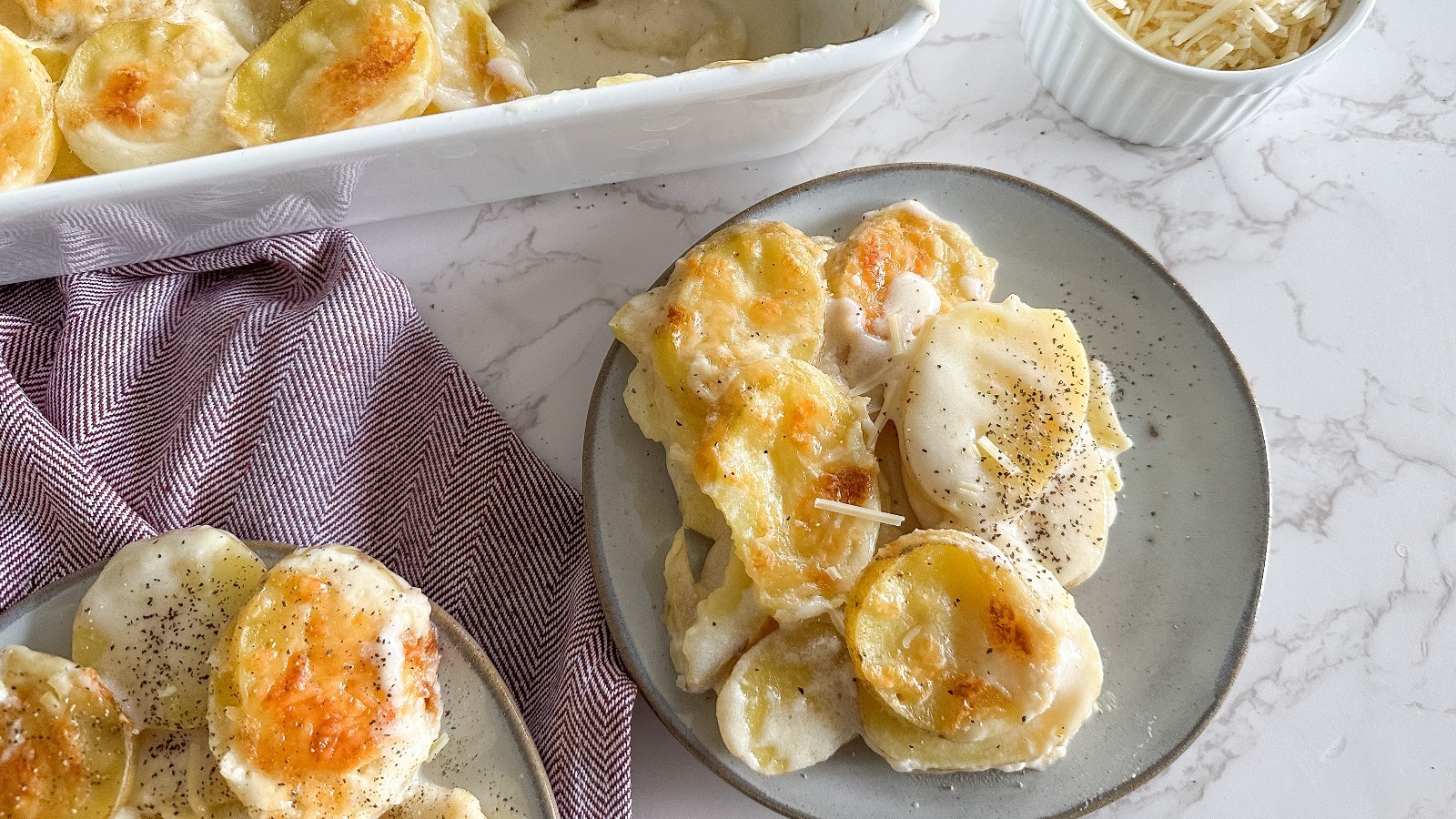Creamy Scalloped Potatoes with Cheese • MidgetMomma