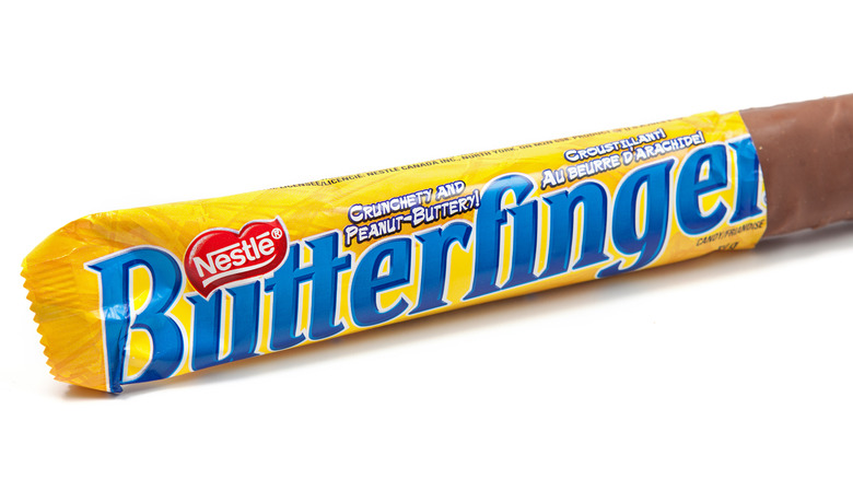Partially unwrapped Butterfinger candy bar