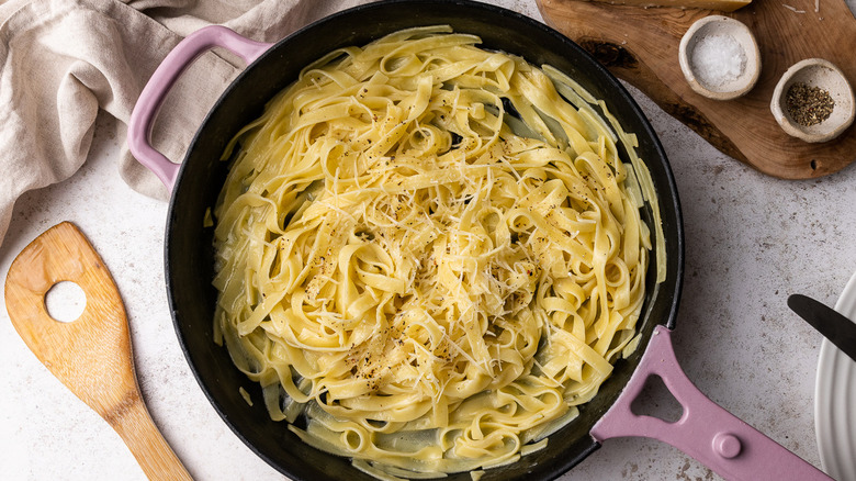 alfredo-sauced pasta in pan