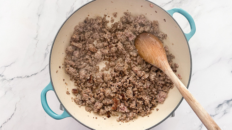 crumbled sausage in skillet