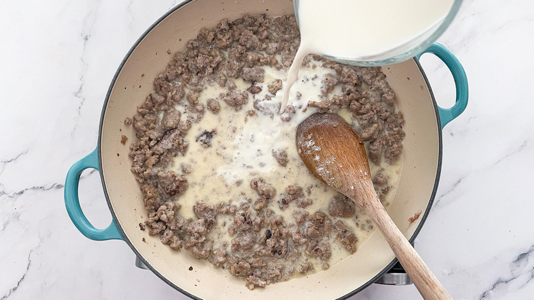 milk pouring into skillet 