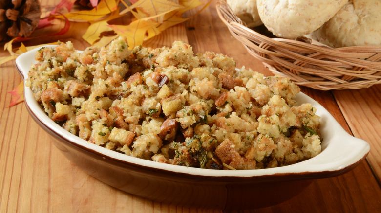 Stuffing in serving dish sitting on table