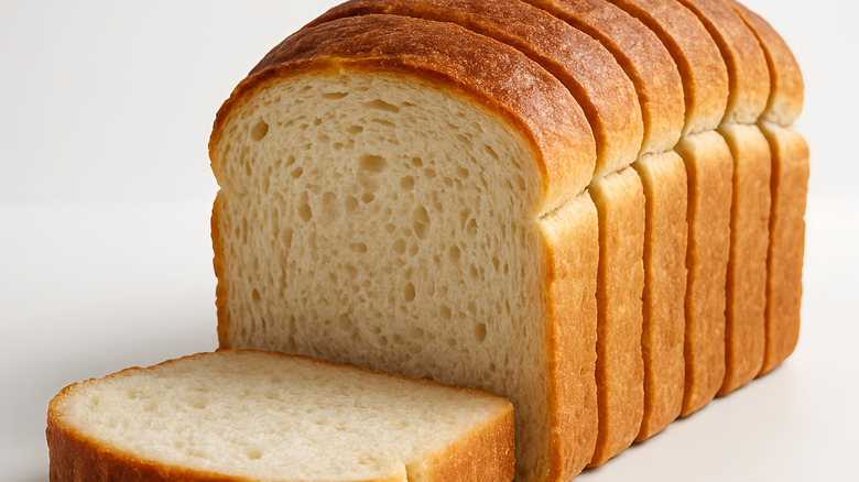 A sliced loaf of white bread