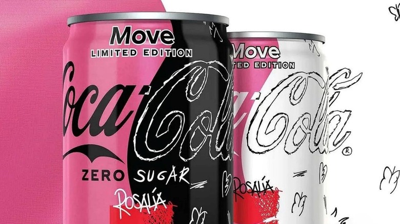 Two Coca Cola Move cans