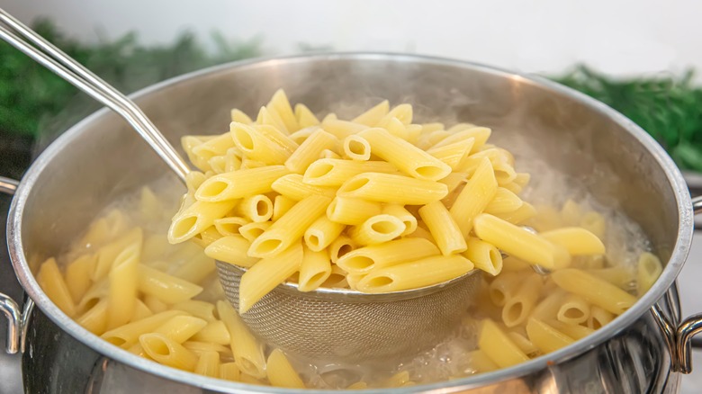penne pasta in boiling water