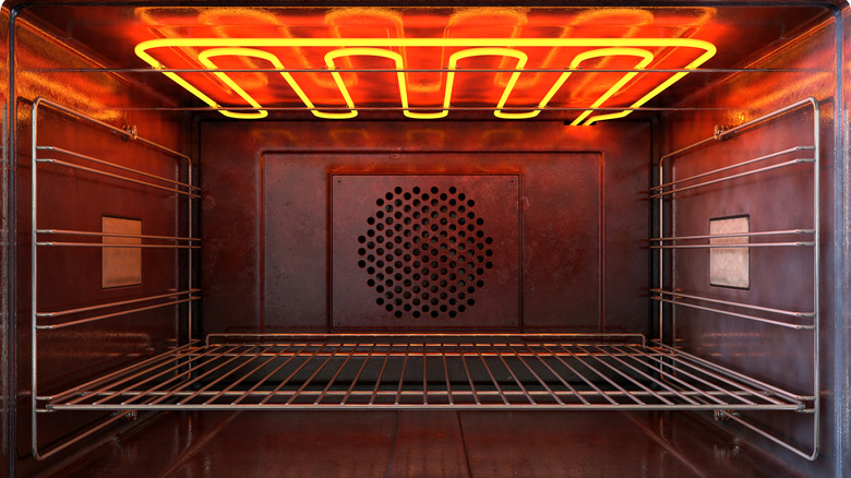 Oven interior with glowing heating elements