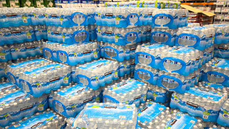 Pallets of Kirkland Signature bottled water stacked at Costco