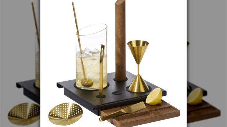 set of cocktail making tools for a home bar