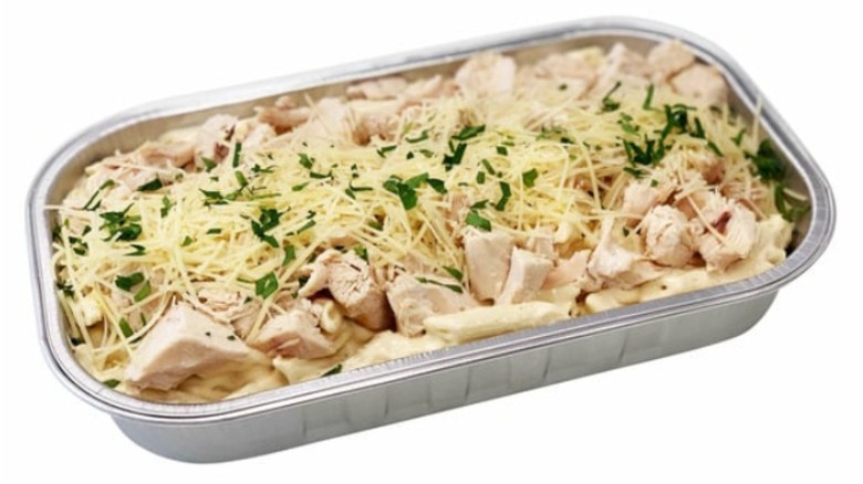 A tray of Kirkland Signature Chicken Alfredo with Penne Pasta