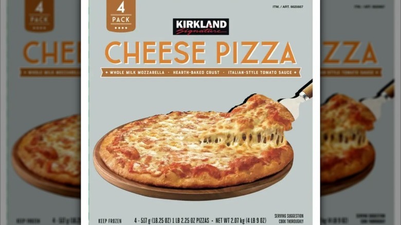 view of a box of Kirkland Signature Cheese Pizza, depicting a cheese pizza being served on the front.