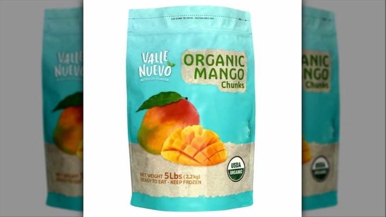 closeup of a bag of Valle Nuevo Organic Mango Chunks, depicting an open cut mango.