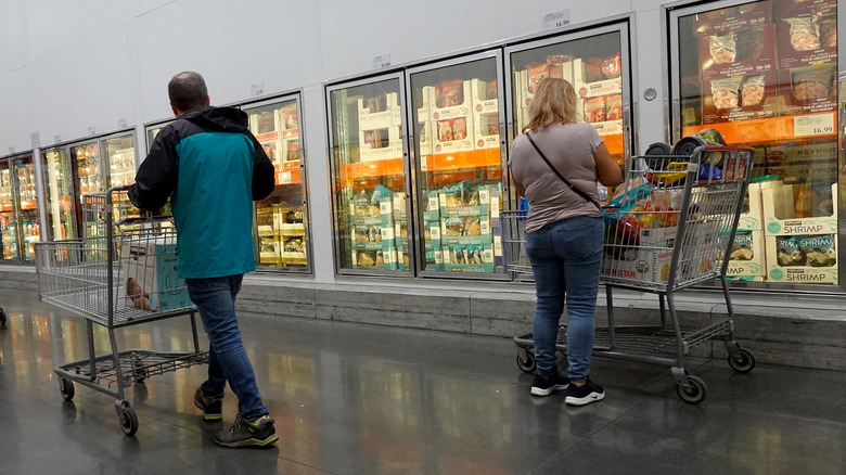 Customers shopping in Costco's frozen foods section
