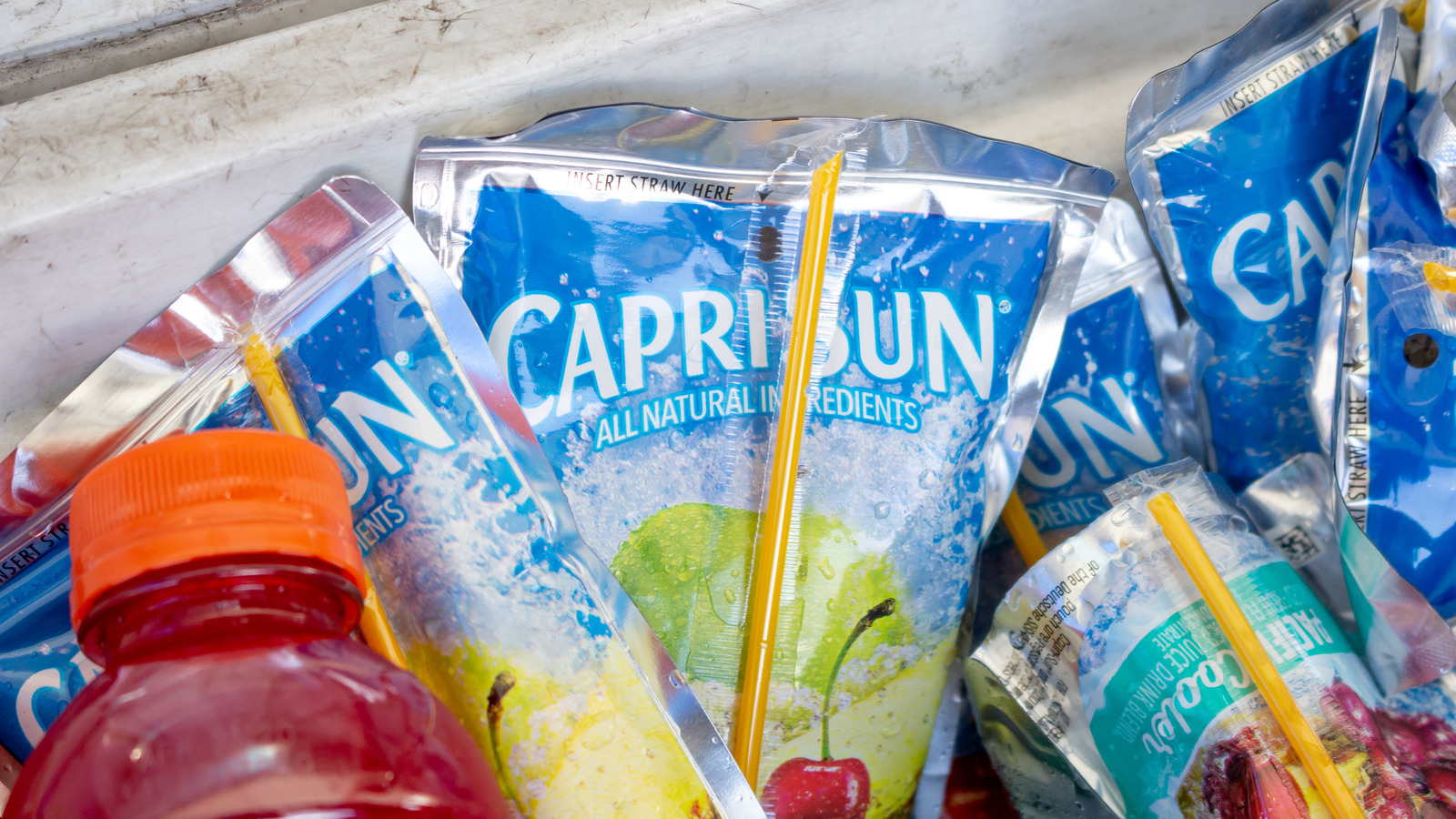 https://www.thedailymeal.com/img/gallery/costco-is-kicking-off-summer-with-a-very-adult-version-of-capri-sun/l-intro-1682106194.jpg