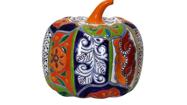 A painted ceramic pumpkin