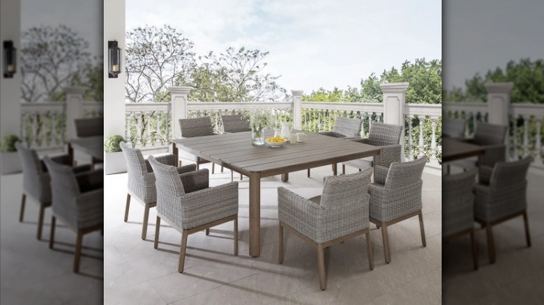 Sirio Palermo outdoor dining set outside by trees
