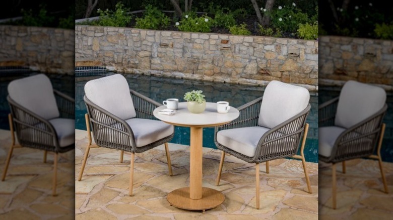 SunVilla outdoor set sits by pool