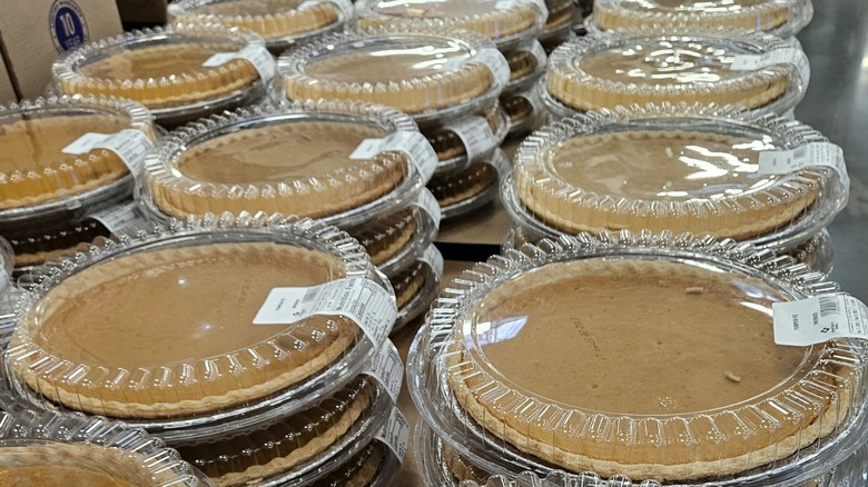 Rows of pumpkin pies on display in the Sam's Club bakery