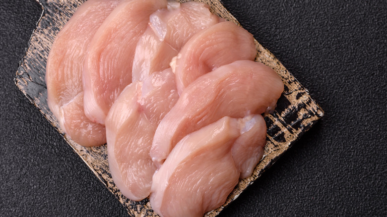 slices of raw chicken