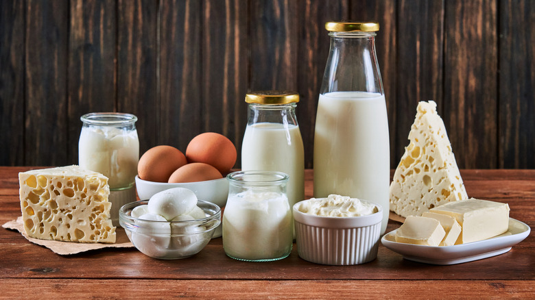 An assortment of dairy products against a rustic background