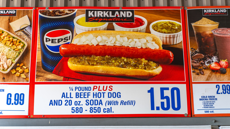 Costco display showing the 1/4 pound all beef hot dog and 20 oz soda combo for $1.50