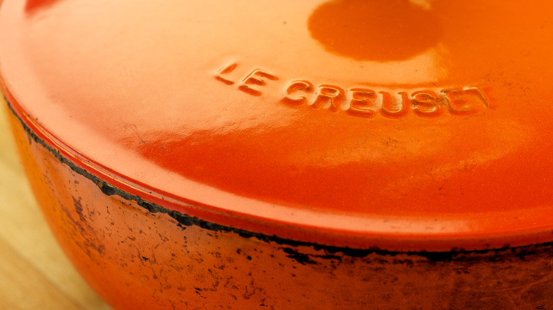 orange le creuset pot