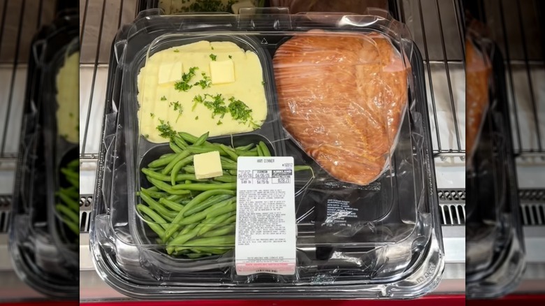 A tray of Costco's ham, mashed potato, and green bean Easter dinner