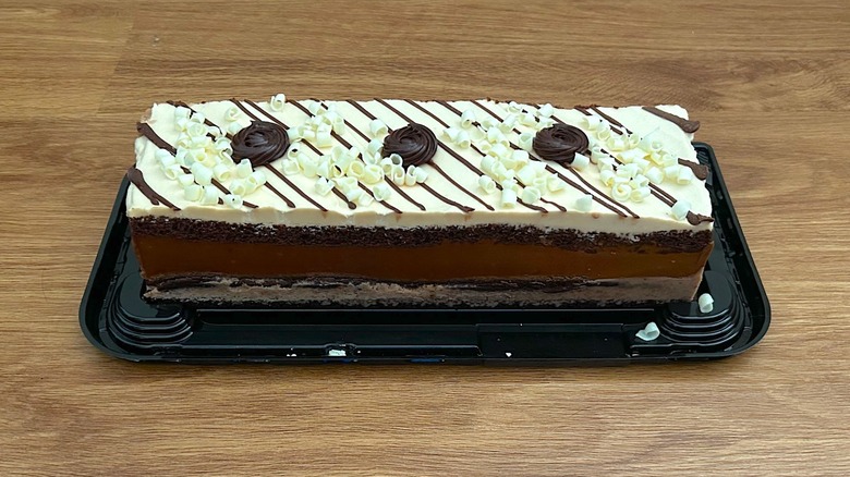 Whole Costco Mocha Crunch Bar Cake with lid removed