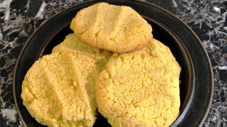 Plate of corn dodgers on a marble counter