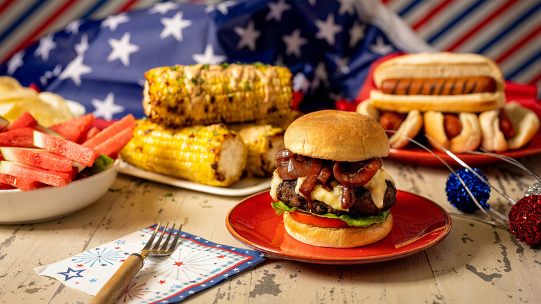 Barbecue foods on table with American flag