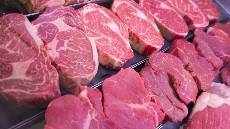 Different cuts of raw steak