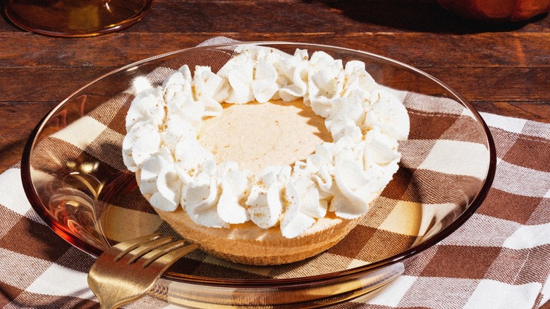 Crumbl Pumpkin Cream Pie on glass plate