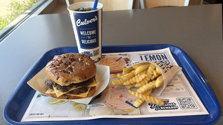 Culver's burger on a tray with fries and a drink