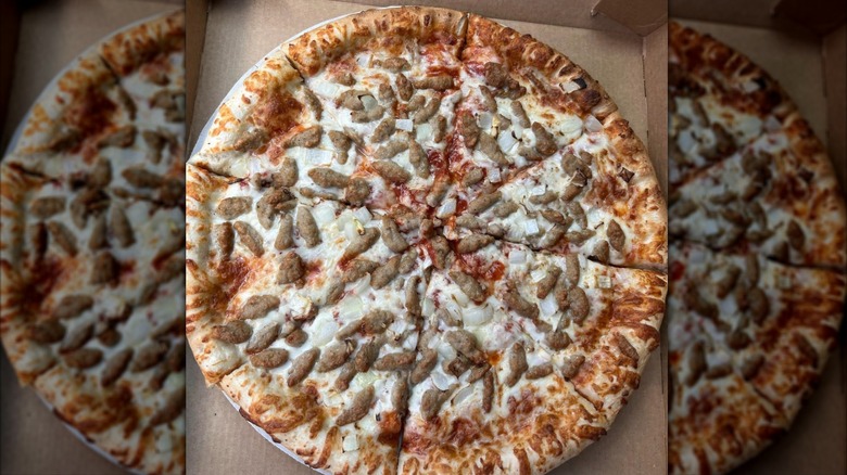 A photo of a full pizza from Hunt Brothers Pizza inside of a cardboard box