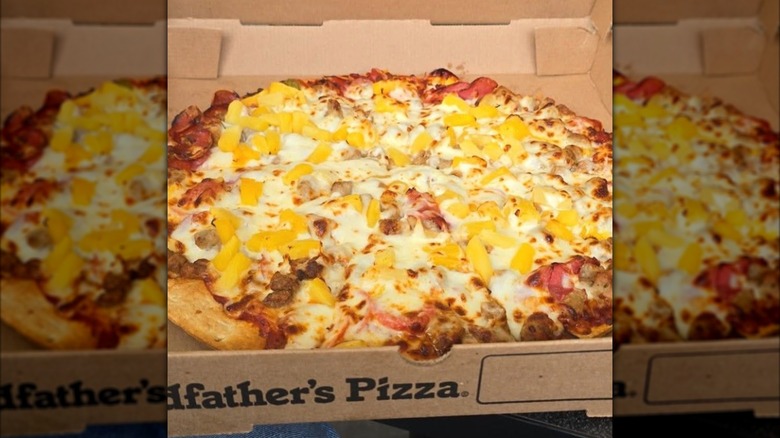 A photo of a Godfather's pizza inside of a box