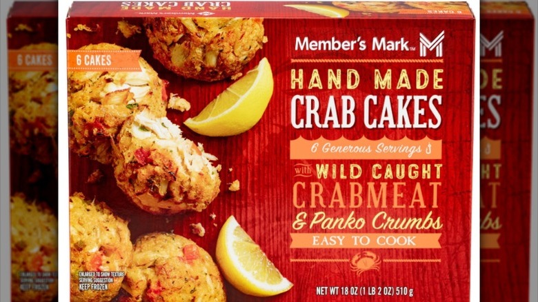 A red box of Member's Mark Hand Made Crab Cakes with photos of four crab cakes and 2 slices of lemon