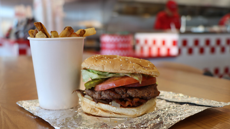 Five Guys burger and fries on table