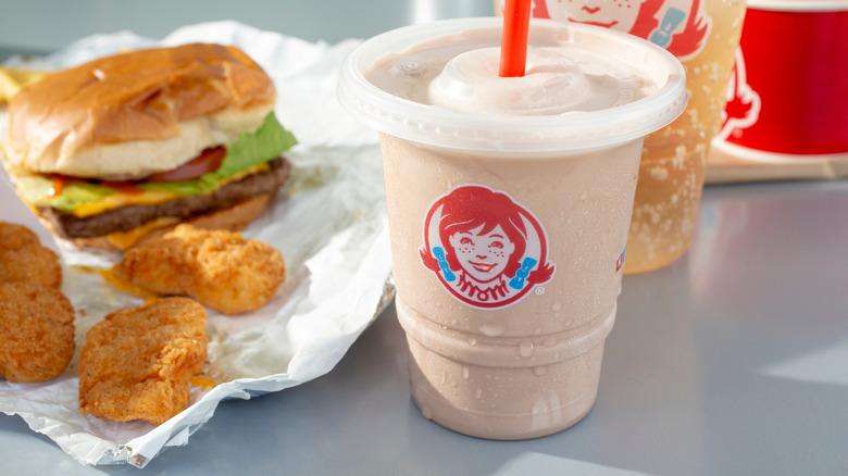 Wendy's nuggets, burger, drink, and Frosty on table