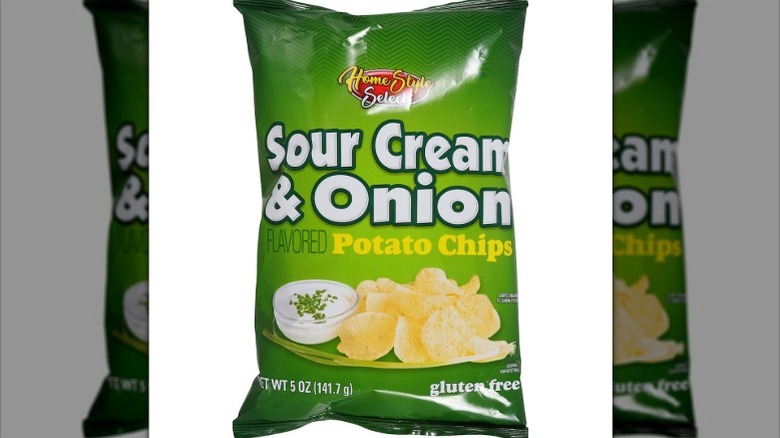 A green packet of Home Style Select Sour Cream & Onion Potato Chips
