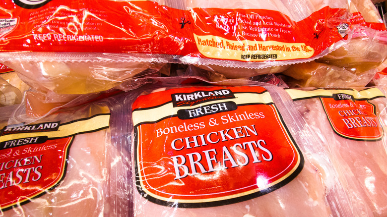 Kirkland Signture raw boneless and skinless chicken breasts in plastic packaging