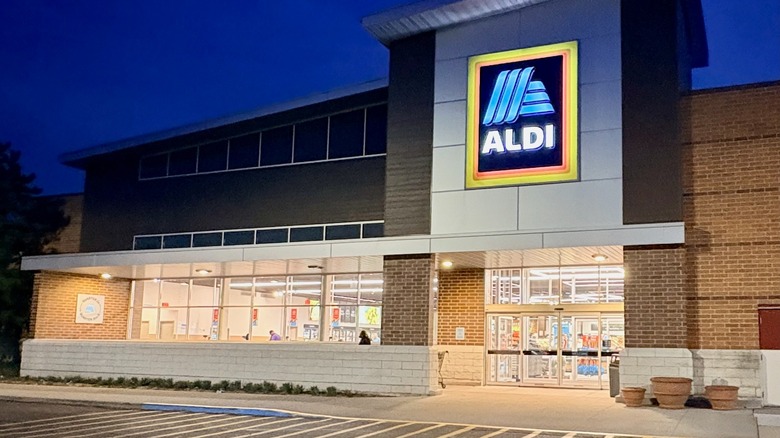 The exterior of an Aldi at night