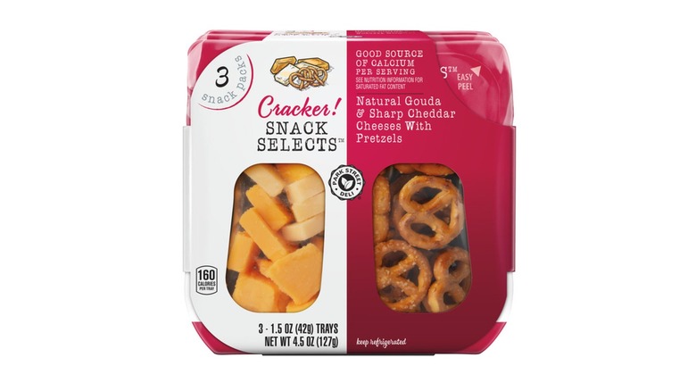 A pack of Aldi Snacks Selects with cheddar cheese and pretzels on a white background