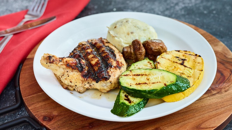 airline chicken breast with potatoes and vegetables