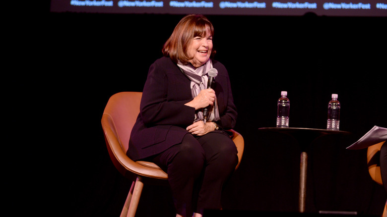 Ina Garten speaking into a microphone