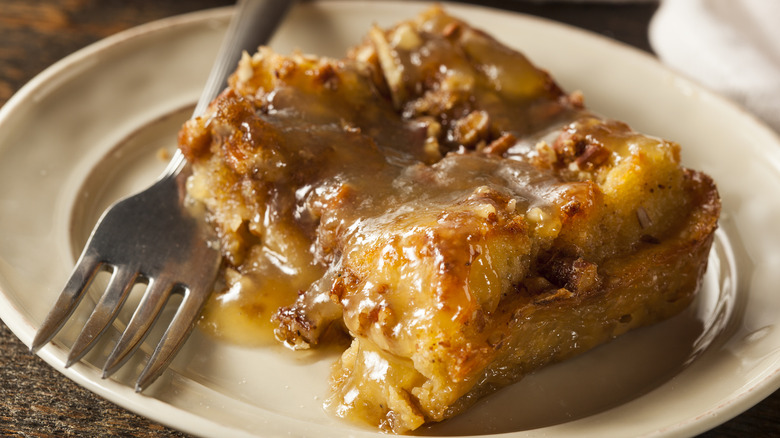 A slice of bread pudding on a plate