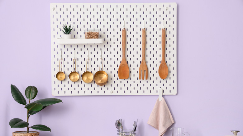 A pegboard in kitchen