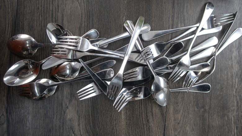 A pile of forks and spoons