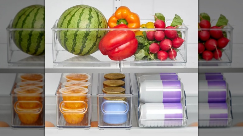 Costco plastic organizer bins in fridge holding food